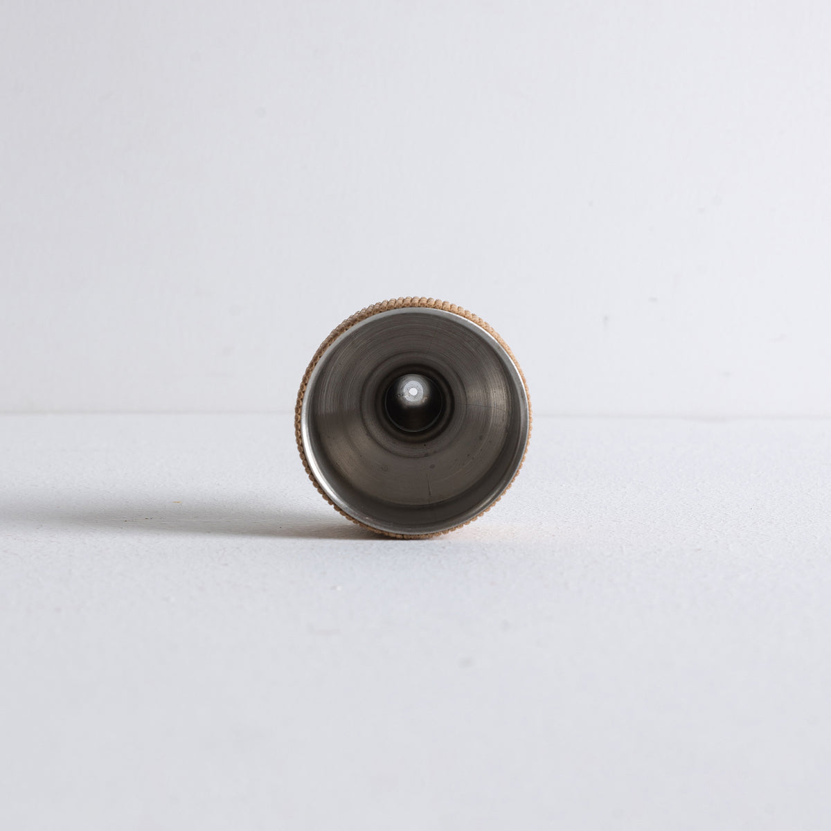 Top view of Kin Object's metal incense powder dropper with bamboo details