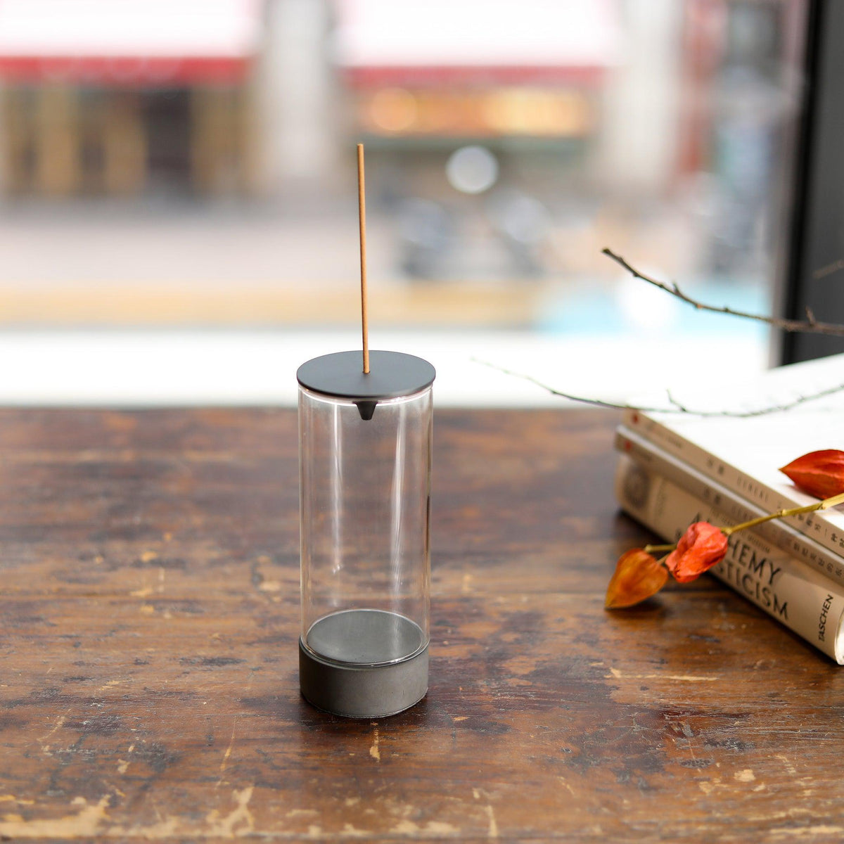 Chrysalis Backflow Stick Incense Burner by Kin Objects on Wooden Table