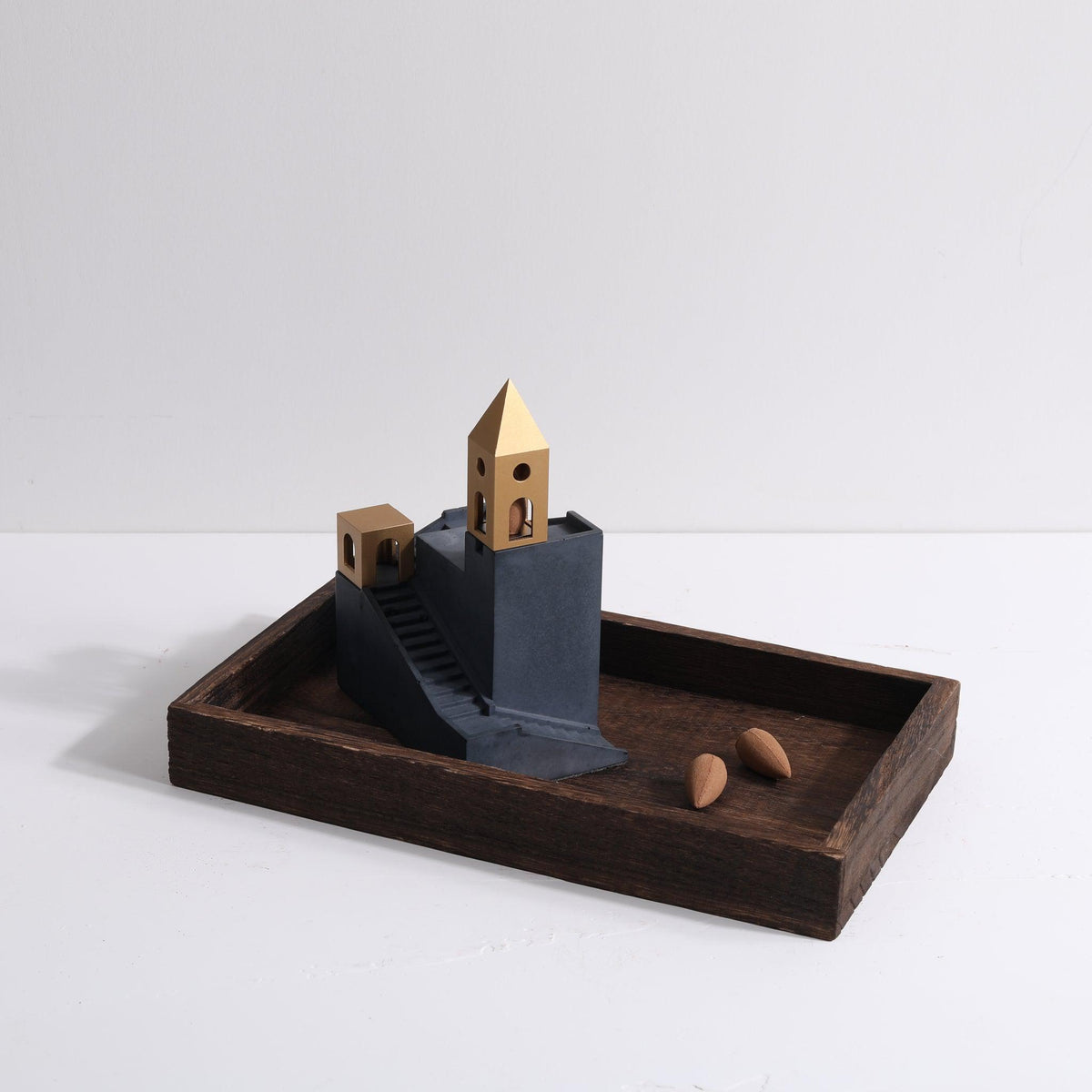 Cloud Keep Incense Fountain by Kin Objects on a Wooden Tray with Incense