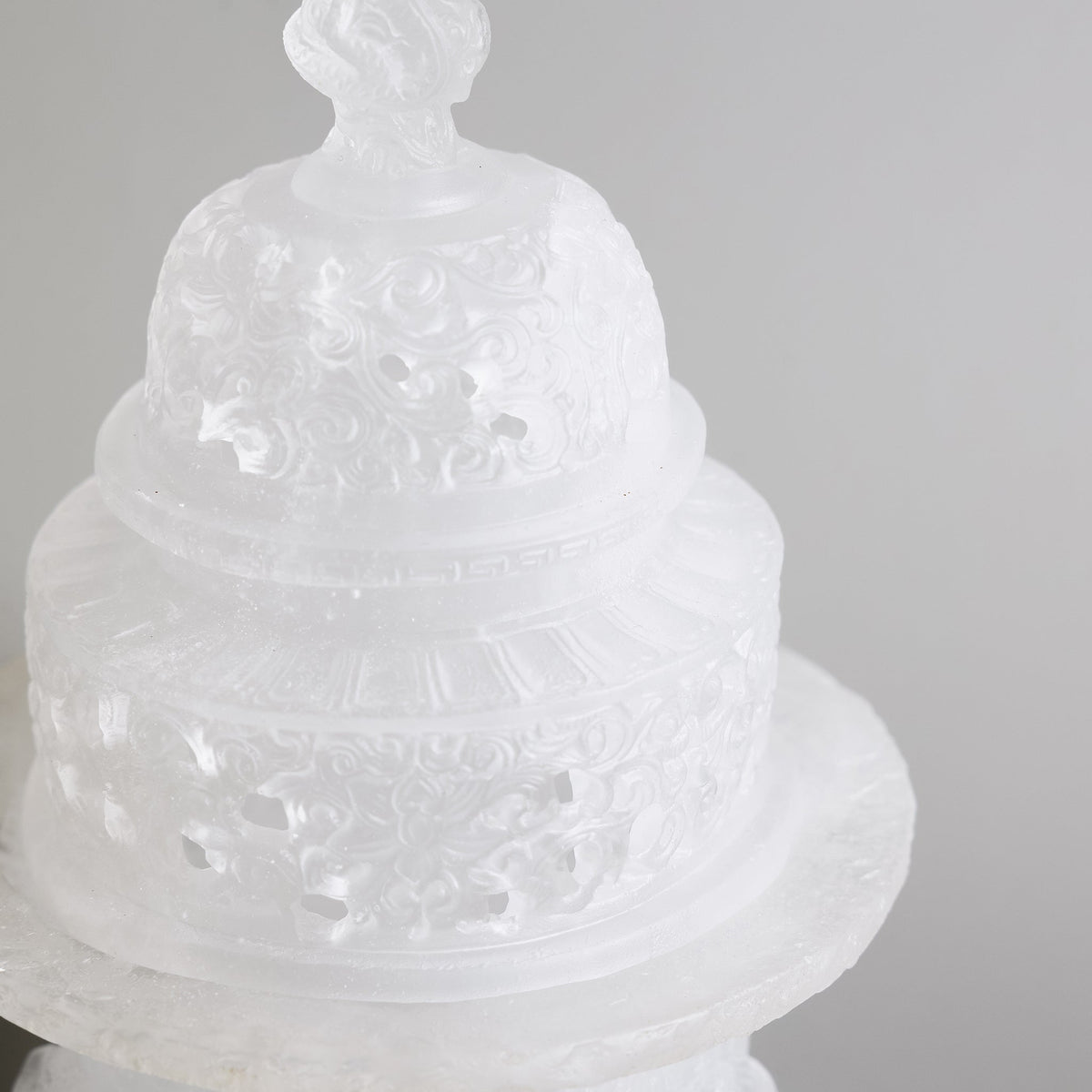 Close up of ornate lid of liuli glass incense burner