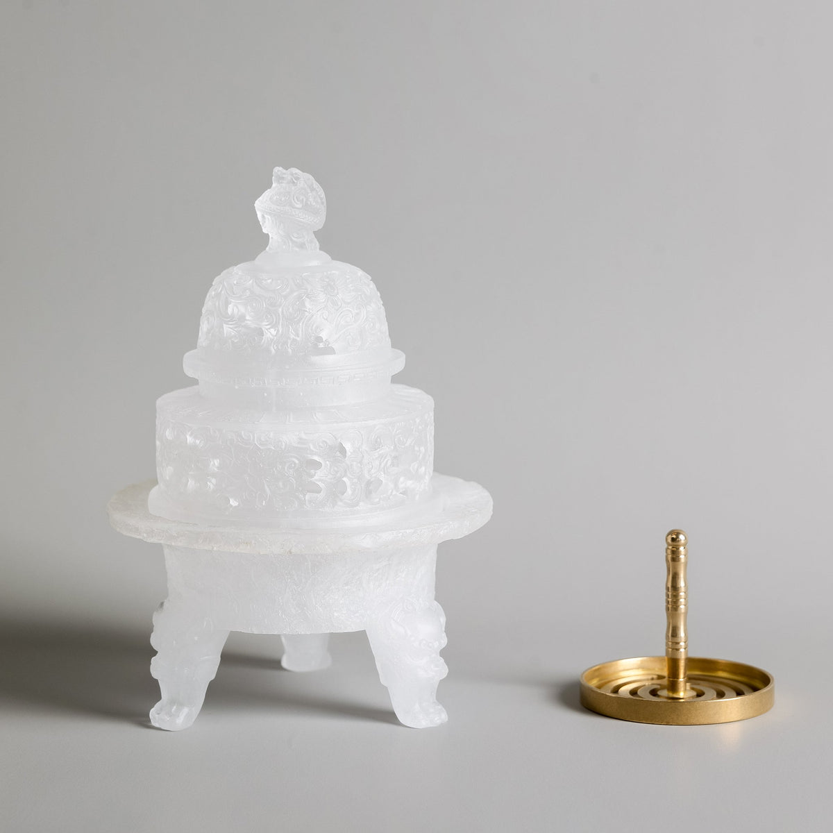 The Monument liuli glass incense powder burner with a bronze incense trail mold