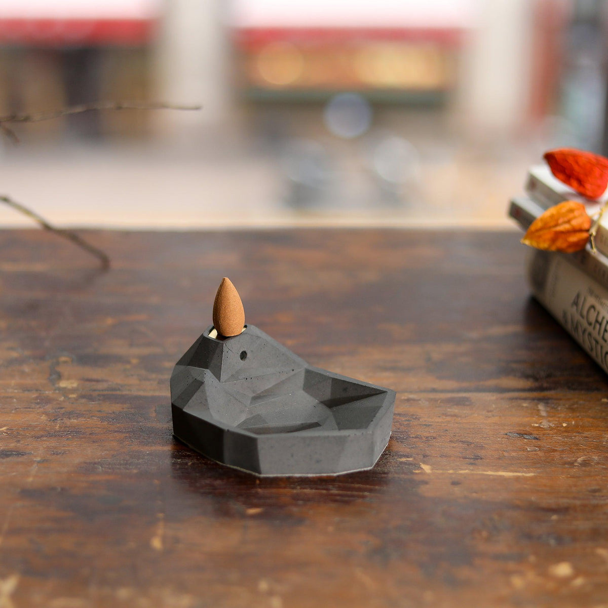 Top view of Mountain & Lake Incense Waterfall by Kin Objects on a wooden table