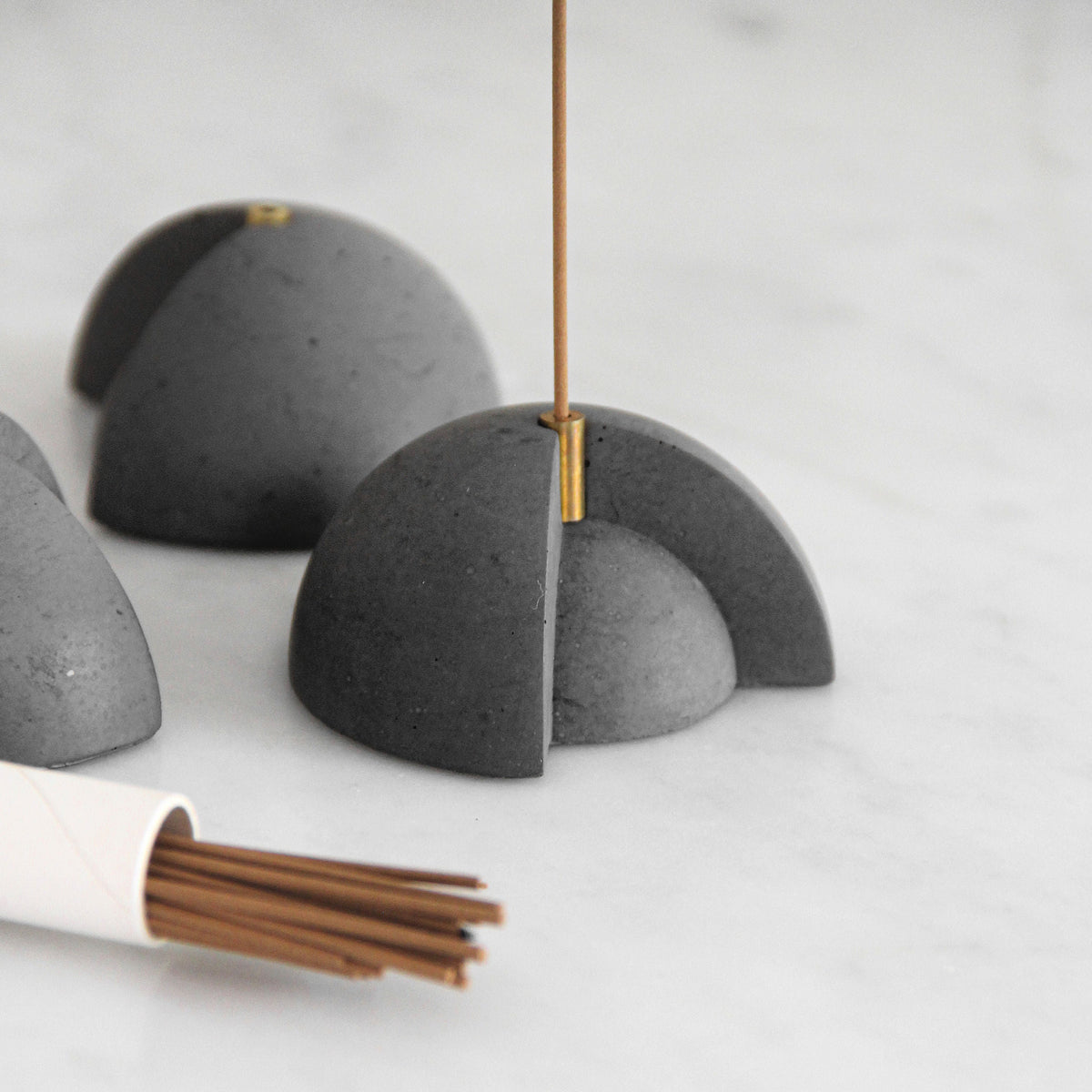 3 Minimal Concrete Core Incense Burners on Table