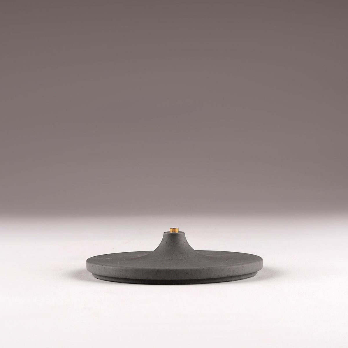 Side View of modern incense burner Disk by Kin Objects