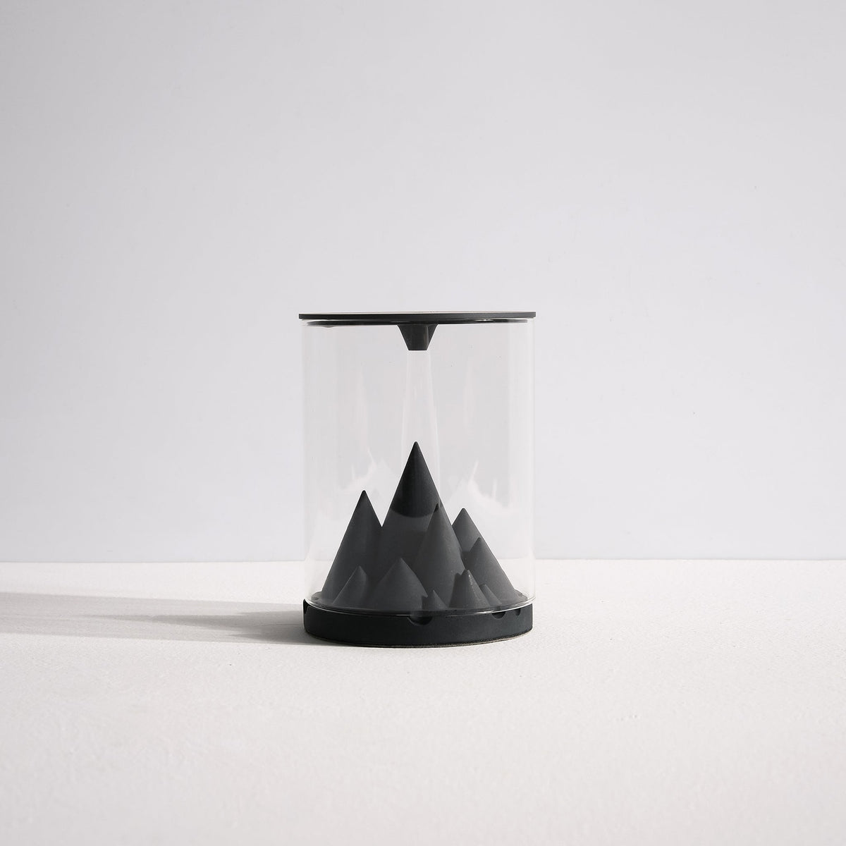 Front view of Karst Terrarium Incense Fountain by Kin Objects