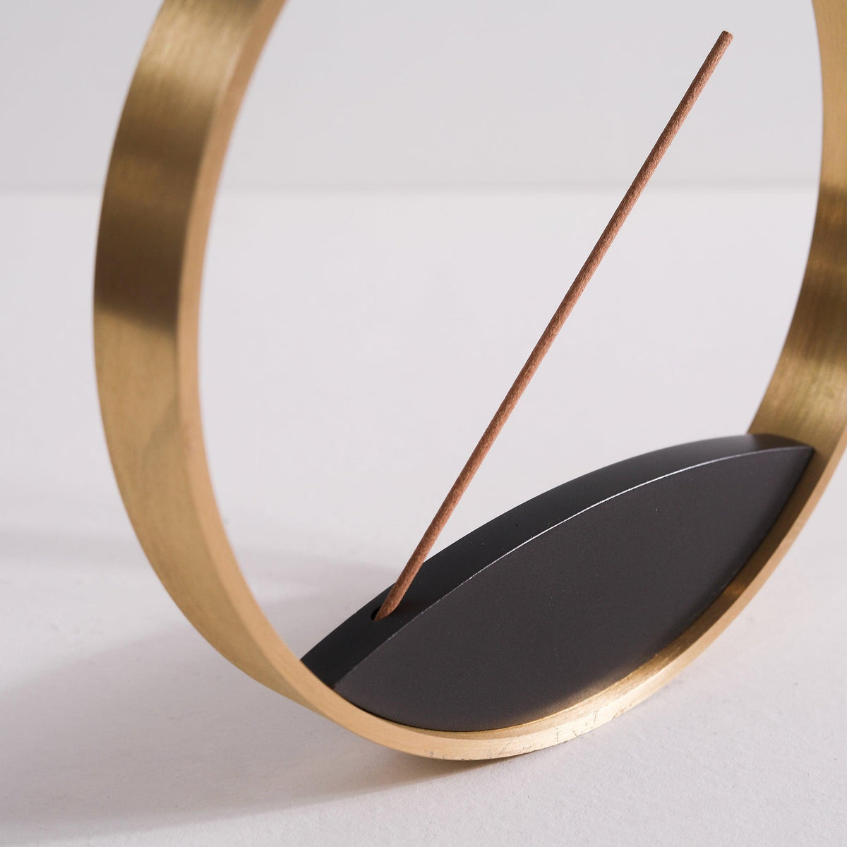 Detailed close up of Moon Horizon incense holder by Kin Objects