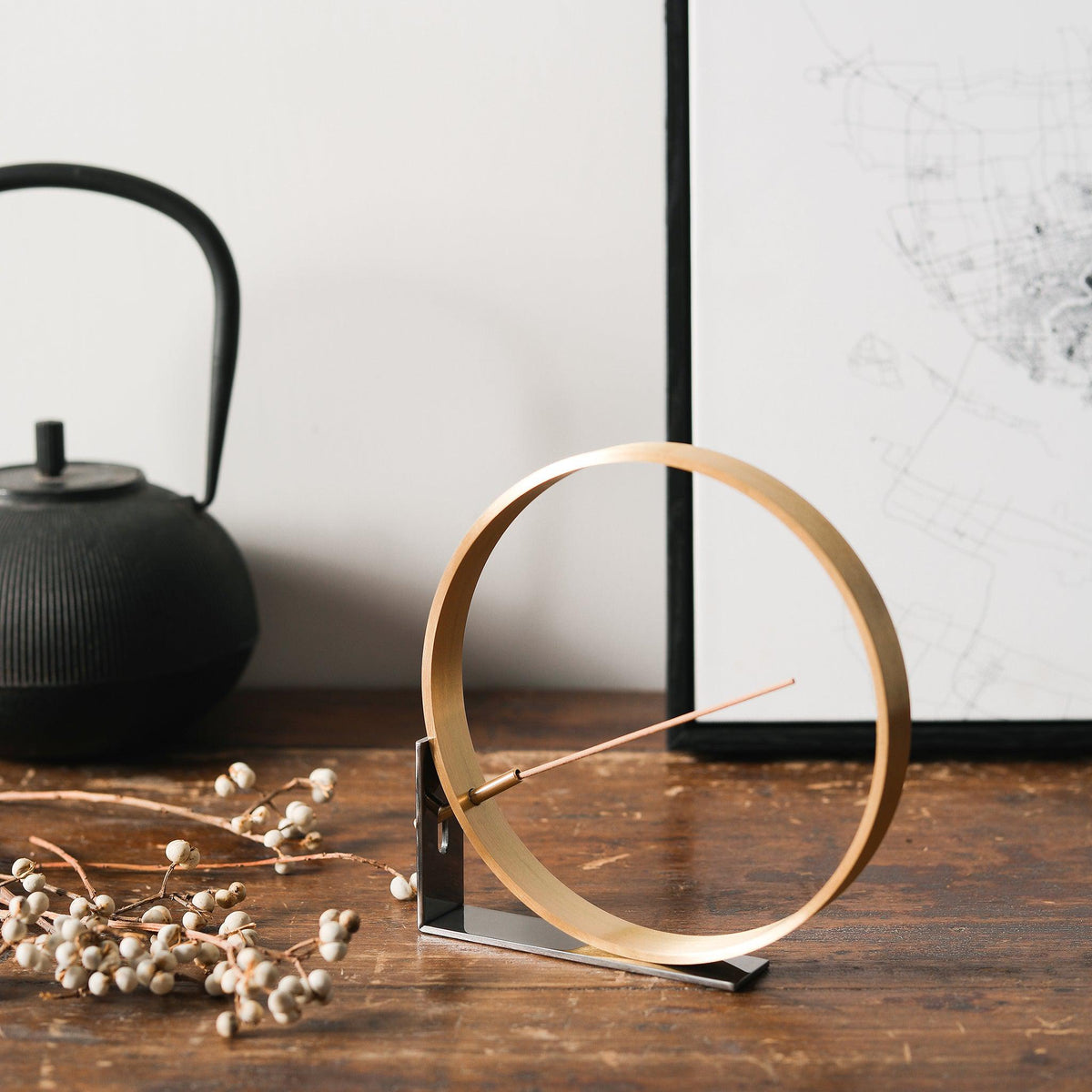 Elegant minimal incense holder by Kin Objects on a wooden table