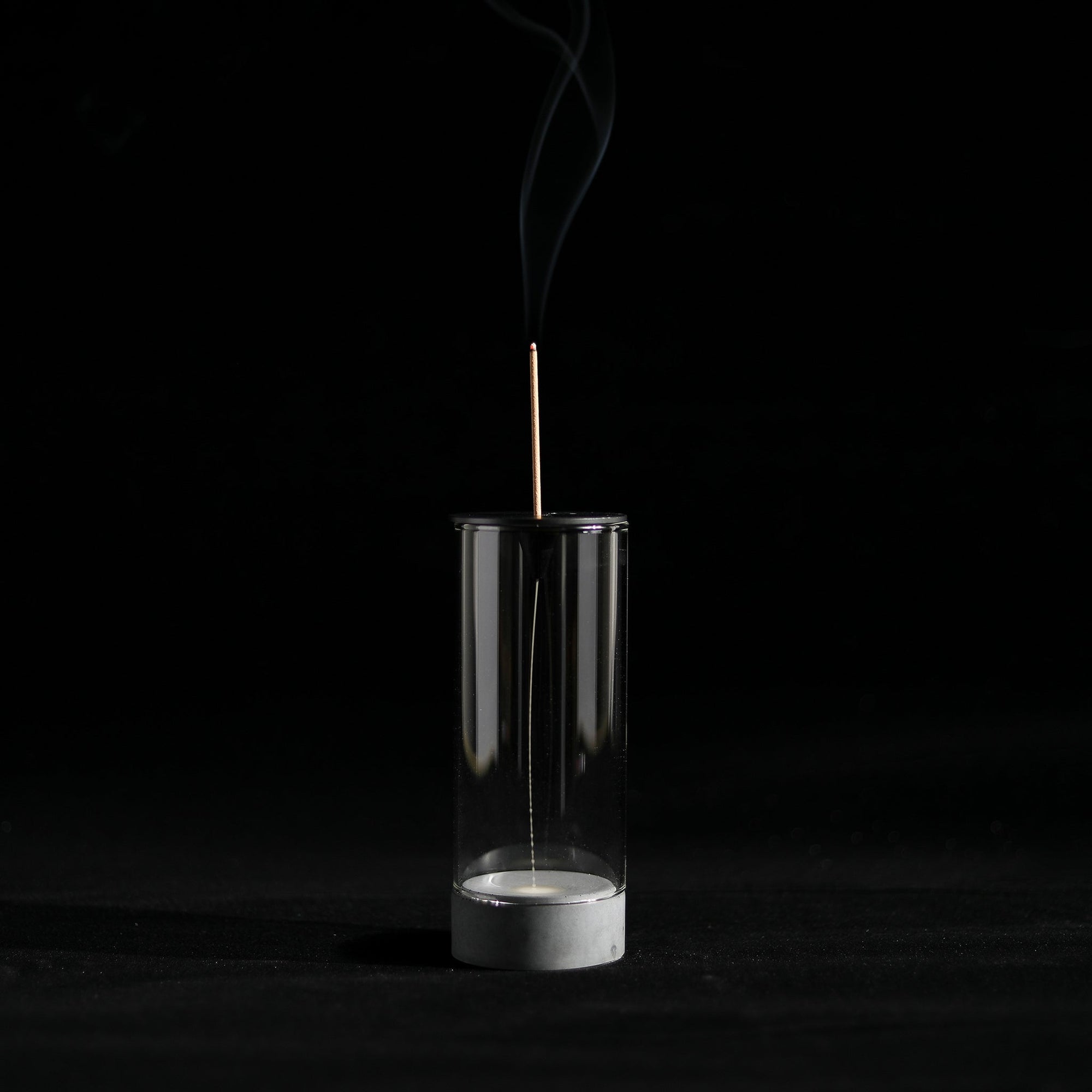 Smoke Flowing in Chrysalis Backflow Stick Incense Burner by Kin Objects