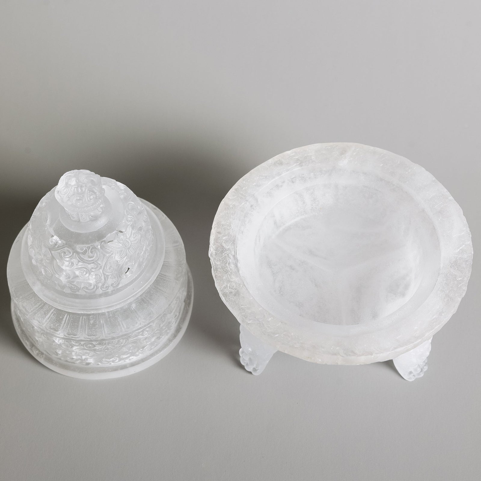 A liuli glass incense powder burner shows an amber glow after several uses