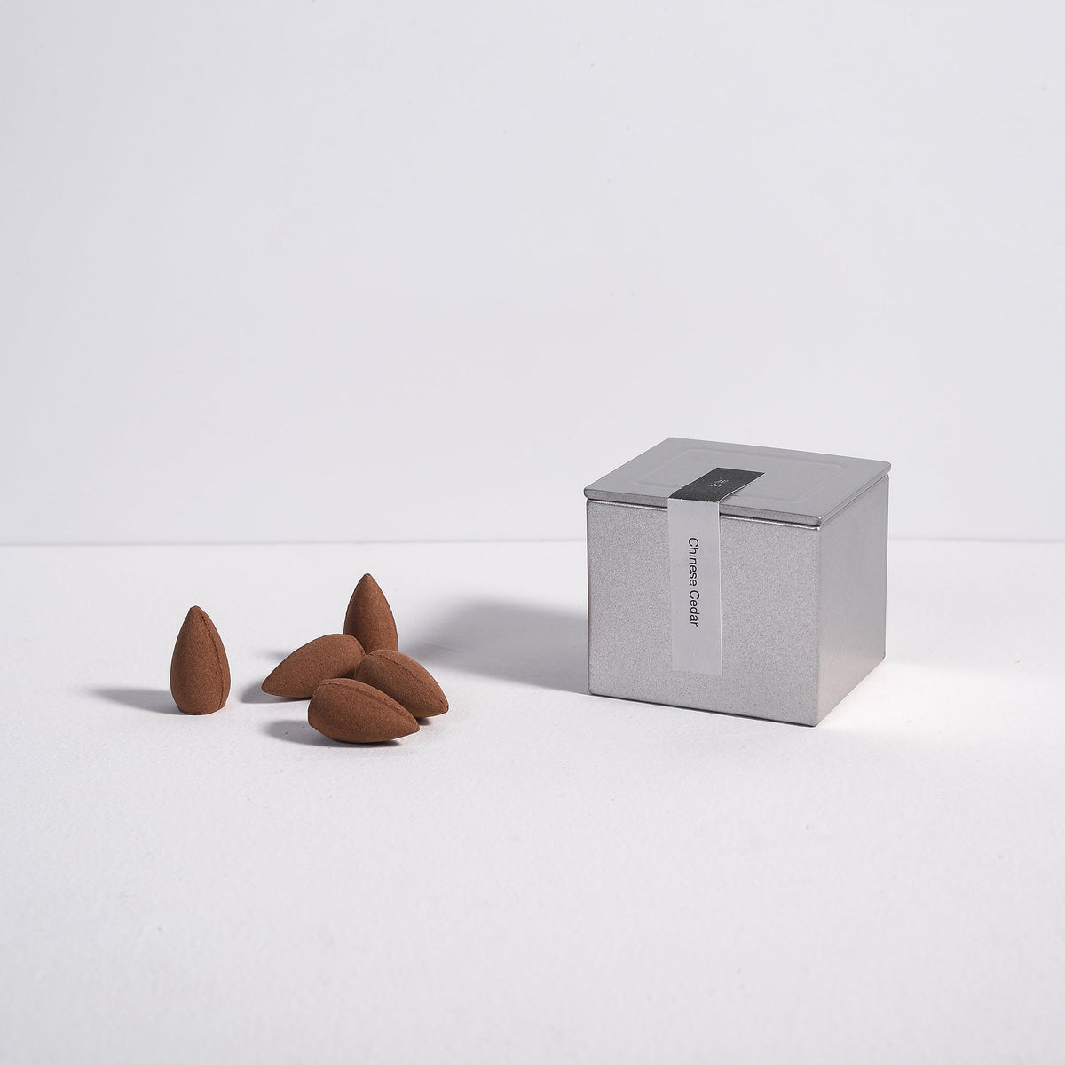 Backflow Incense Cones by Kin Objects Box on Table