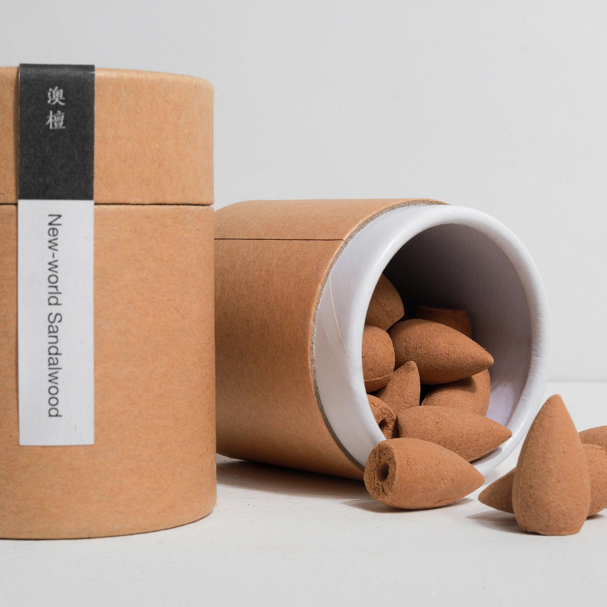 Cardboard Box Open with Backflow Incense Cones by Kin Objects