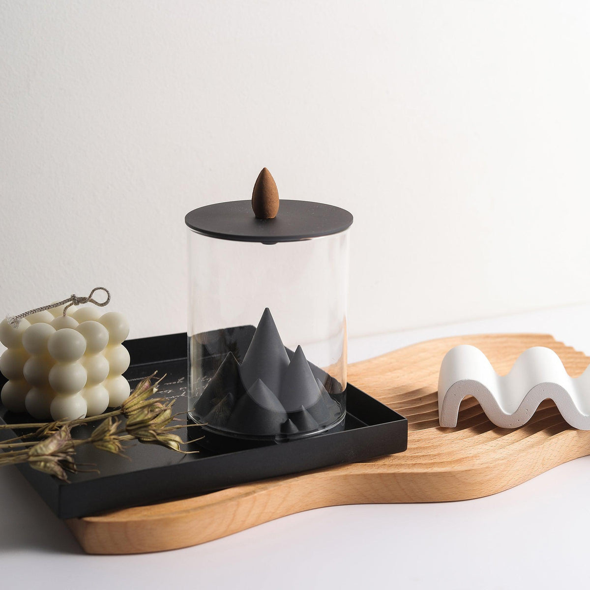 Karst Incense Burner in a Home Setting with Candles and Wooden Tray