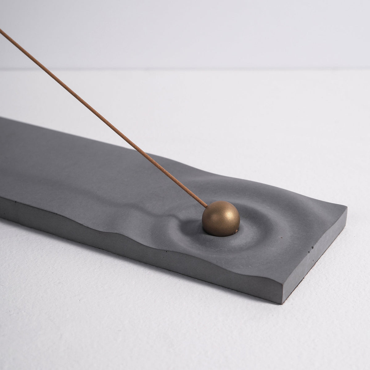 Ripple incense burner in gray by Kin Objects close up