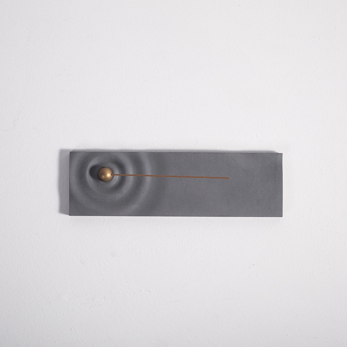 Ripple incense burner in gray by Kin Objects top view